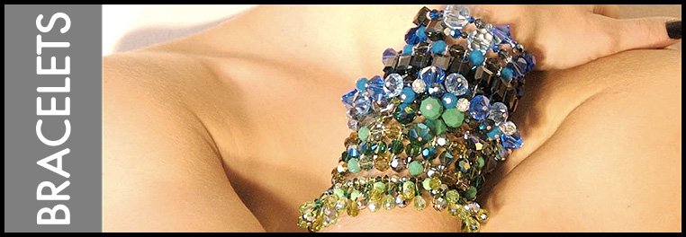 Colorful Swarovski Crystal Bracelets Colorful designer Swarovski Crystal Bracelets. Bracelet designs from cuffs, bangles, fringe, and charm bracelets